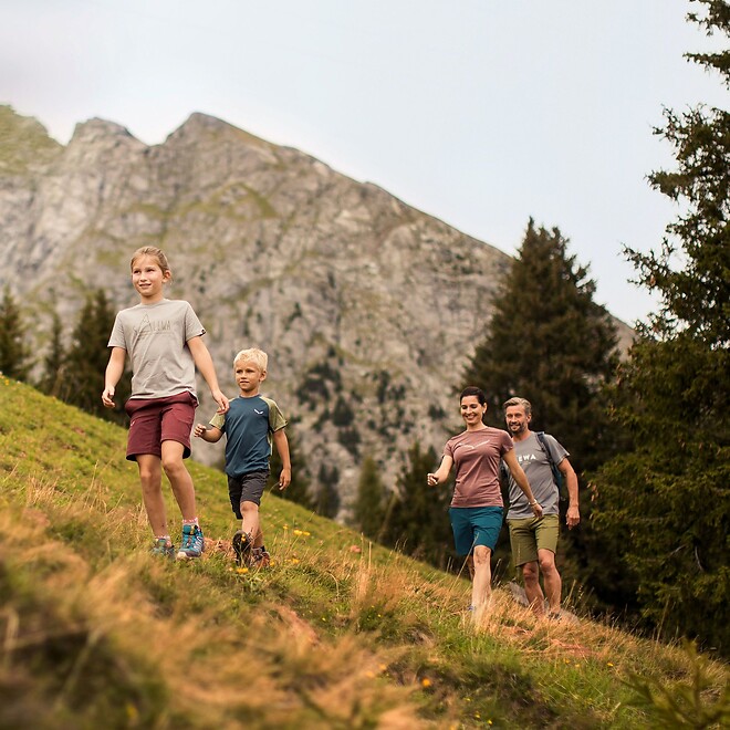 Family on a mountain hike at Meran 2000