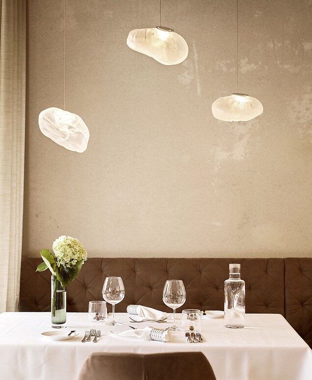 Modern set table for dinner at Hotel Lindenhof