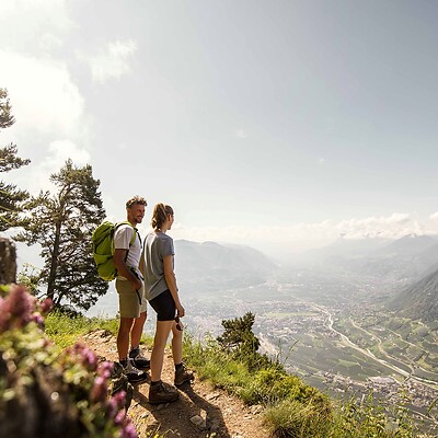 Woman and man on a spring hike in the mountains