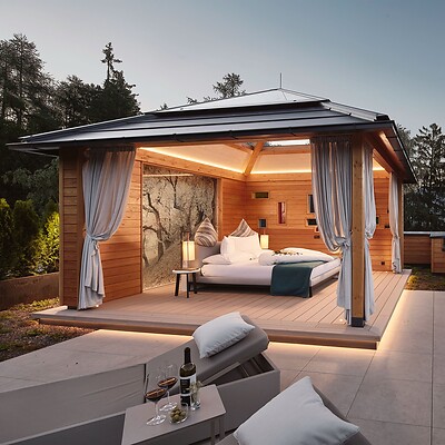 Romantic outdoor bed under pergola at night for two
